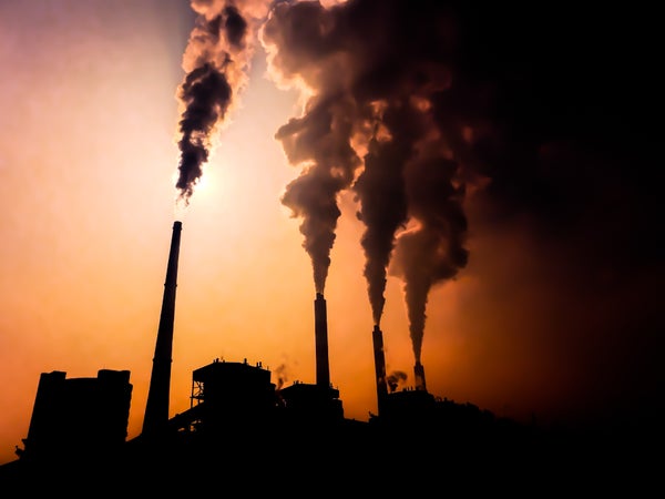 Smokestacks in China spewing smoke.