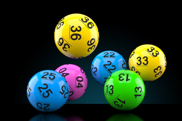 Six colorful lottery balls with numbers, shown against a black background.