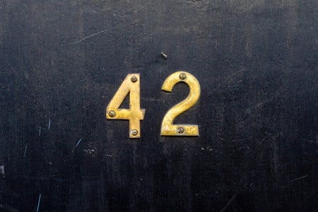 brass numbers 42 on door