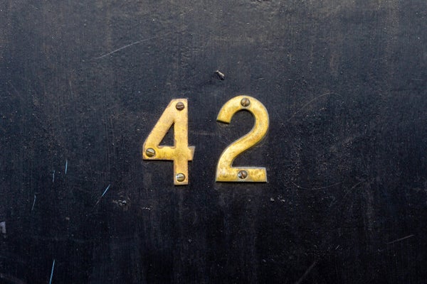 brass numbers 42 on door