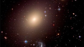 Giant Galaxies from the Universe's Childhood Challenge Cosmic Origin Stories