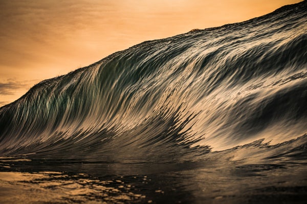 Golden colored ocean wave