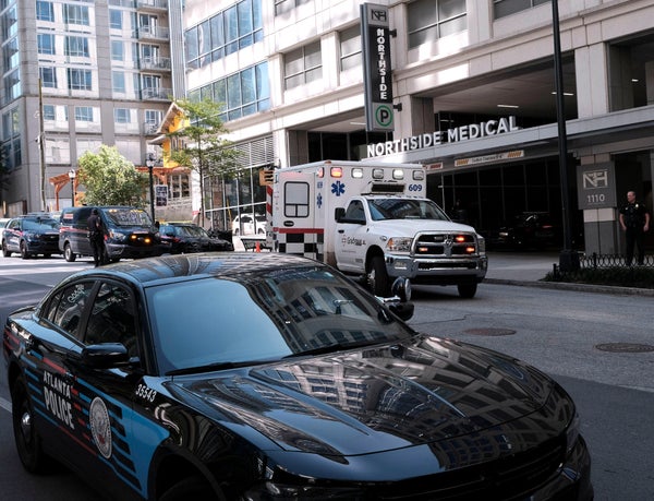 Police and Ambulance cars in front of Northside Medical Center in Midtown Atlanta