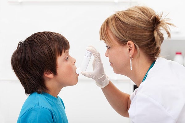 child with inhaler