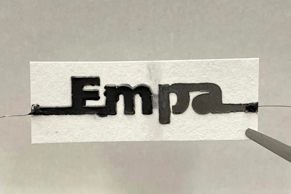 Paper with logo printed on it