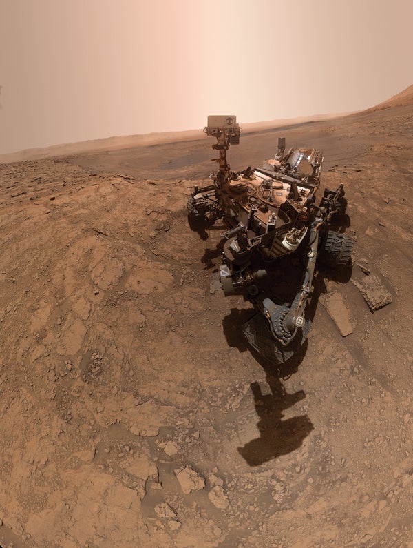 Curiosity rover on the Mars surface.