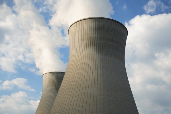 Two nuclear cooling towers viewed from below