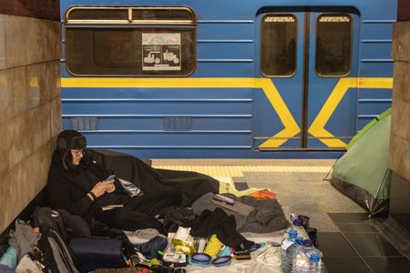 Person checking cell phone while sheltering in place