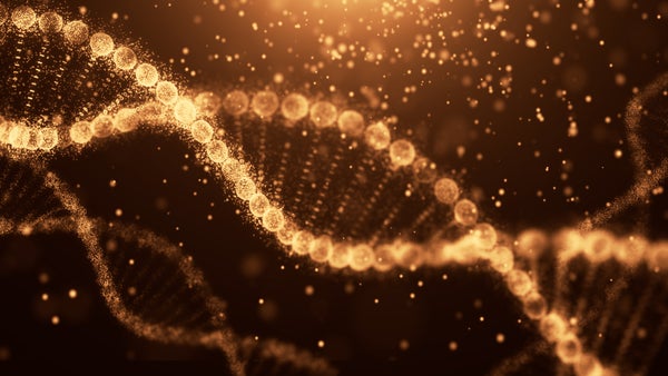 Yellow-white circles forming two DNA molecule structures against a black backdrop.