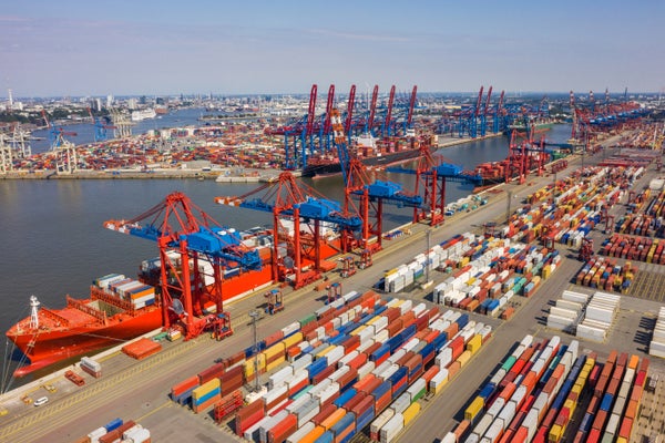 Aerial view of a container port with colorful containers.