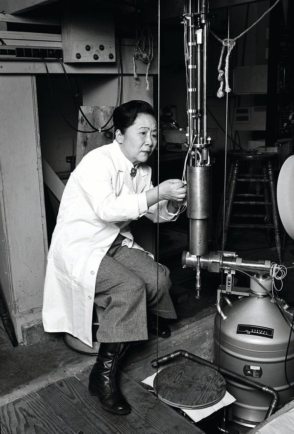 Chien-Shiung Wu in laboratory setting working on equipment.