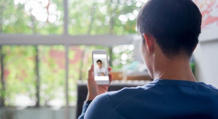 Teenager video conferencing with physician