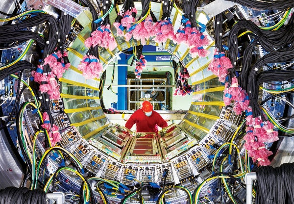 A technician installs cables on the new sPHENIX detector Brookhaven National Laboratory