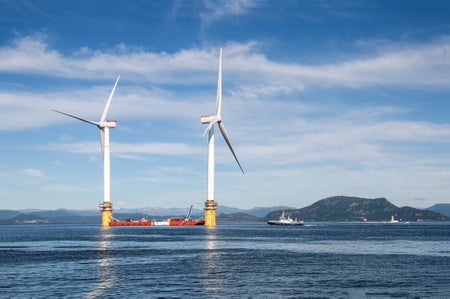 Floating wind turbines in the ocean.