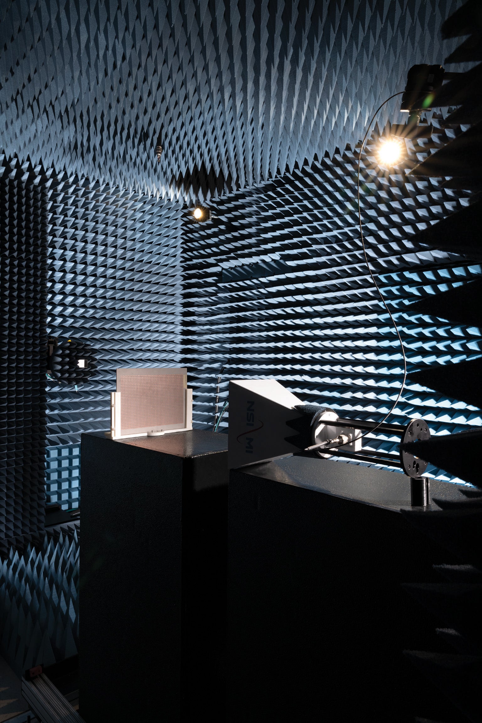 A metamaterial undergoes testing in a chamber that enables very precise measurements of radio and millimeter-wavelength light.