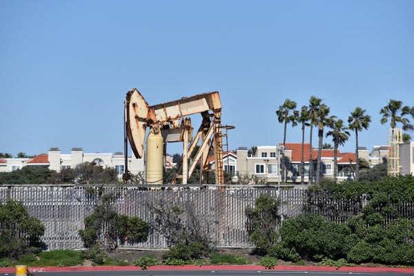 An oil pump jack in a residential area in Southern California