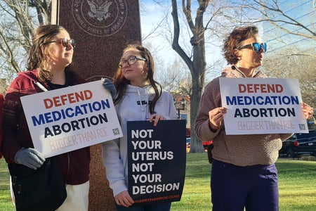 Abortion rights adovcates gather in front of the J Marvin Jones Federal Building