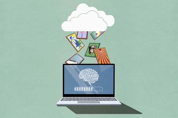 Brain image on laptop screen downloading images from the cloud