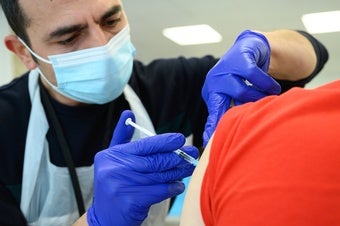 Patient receiving booster vaccine