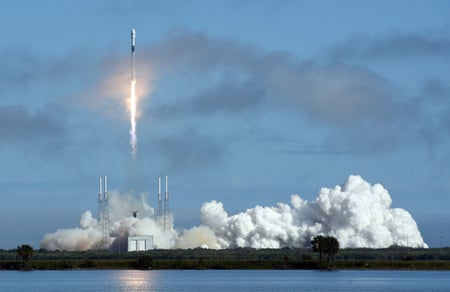 Wide view of daytime rocket launch