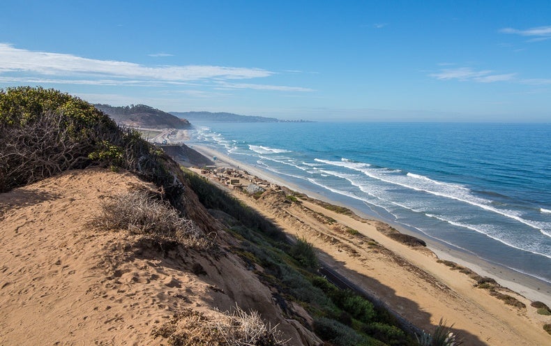 A Beach Town's Dilemma: Protect Homes or Save the Shore? - Scientific ...