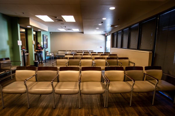 Rows of empty chairs at the waiting room of an abortion clinic.
