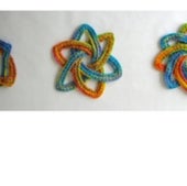 Three knitted, two-component torus links.