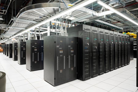 A supercomputer resembling a row of large black metal cabinets