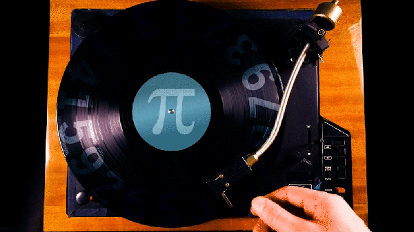 Person turns on a musical player, placing a needle on a vinyl record which has the symbol for the Greek letter Pi on it and the numbers of Pi on the record face