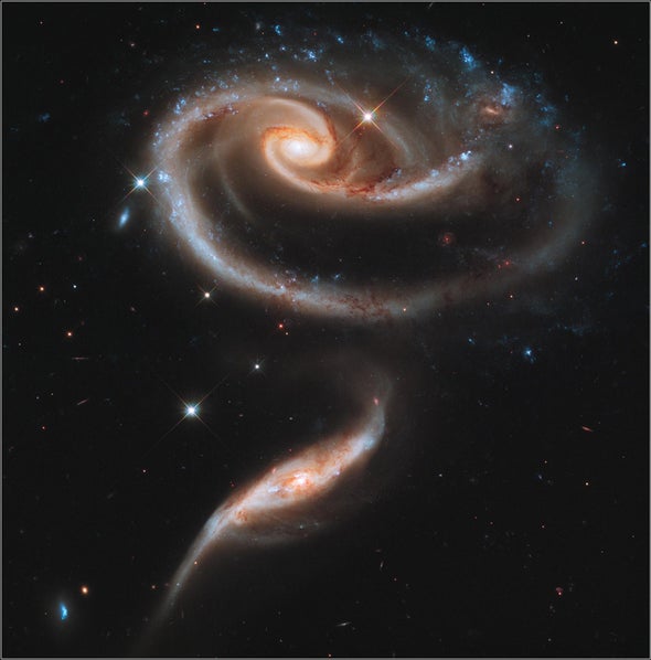 A rose is a...galaxy collision: Hubble sends the people of Earth a flower on its 21st anniversary
