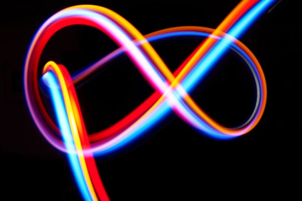 A swirly rainbow infinity symbol