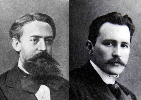 A bearded man in 19th-century garb and a man with a moustache, in dress of the same vintage.