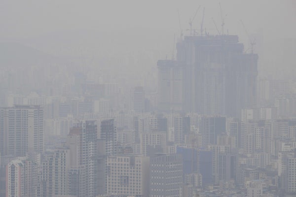 Heavily polluted air obscures buildings