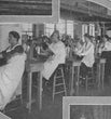 In the Gas-Mask Factory