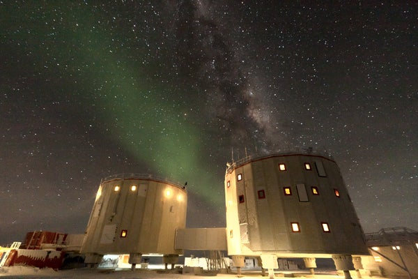 The Concordia research station in Antarctica at night under the Milky Way.