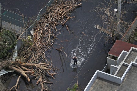 A flooded street is seen as people deal with the aftermath of Hurricane Maria on September 25, 2017 in San Juan Puerto Rico.