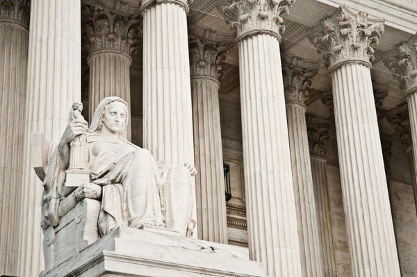 Contemplation of Justice statue in front of the U.S. Supreme Court Building in Washington, D.C.