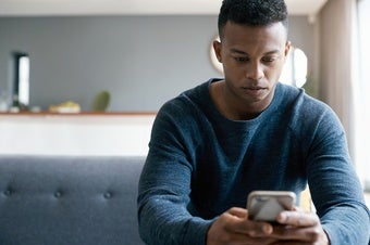 Young man using smart phone