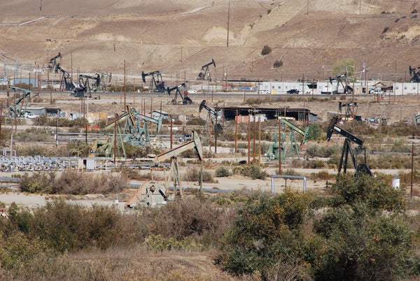 Derricks Pumping Crude in a California Oil Field