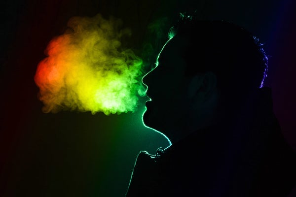 Colored outline of a man exhaling warm breath