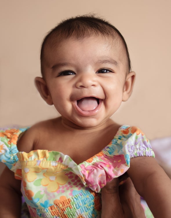 Babies Know the Difference between the Laughter of Friends and Strangers