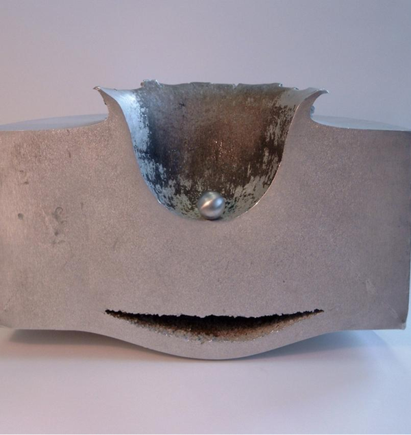 Results of lab-test impact between a block of aluminum and a small aluminum sphere traveling at nearly 7 km per second.