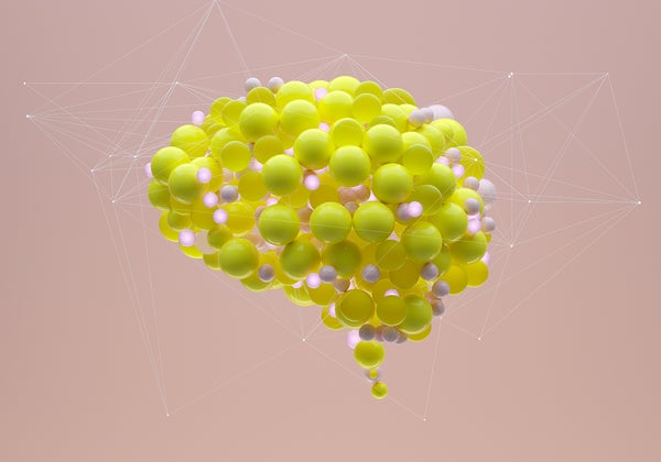 Illustration showing yellow balls forming the shape of a side view of a human brain against a dusty rose backdrop.