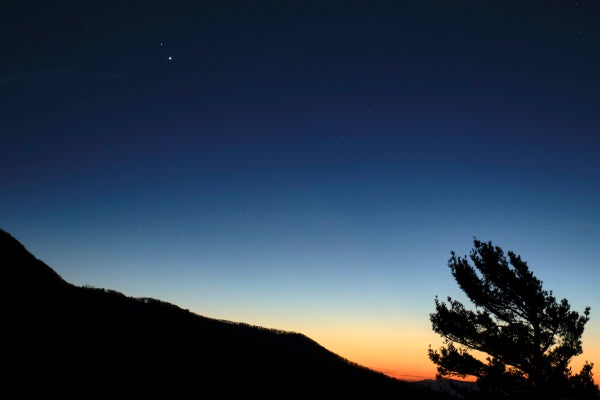 Saturn and Jupiter appear close together after sunset as seen from Shenandoah National Park in Dec 2020