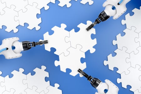 robotic hands holding puzzle pieces