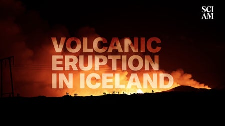 A view of fire and smoke during a volcanic eruption at night in Iceland