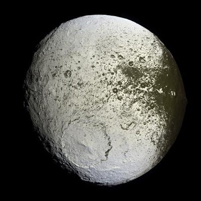 Bright Side of Two-Toned Saturn Moon | Scientific American