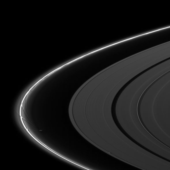 Close-up view shows Saturn's moons reshaping the planet's rings