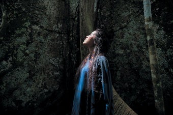 Ashaninka woman by a sacred kapok tree