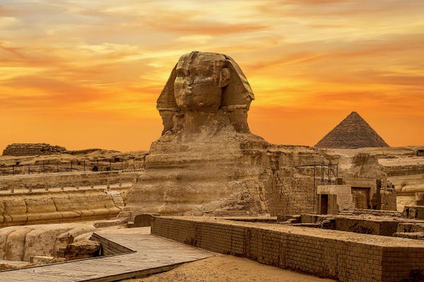Landscape with Egyptian pyramids, Great Sphinx at sunset